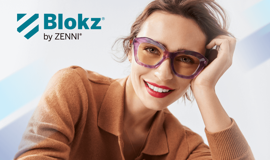 Blokz by Zenni. Woman smiling and wearing purple Blokz glasses with yellow-tinted lenses.